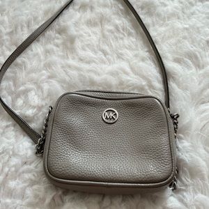Michael kors mini crossbody gray purse. Perfect condition.
